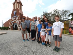 Three generations of the Sassine, Isshak, and Kobrossy families pose July 16, 2017, while attending the 31st annual St. Charbel Festival held in Tecumseh