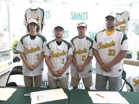 From left,  Patrick Kibble,   Curtis Cunningham, , Carson Burke, Mitchell Prsa after signing to play baseball with St. Clair College Saints on Wednesday. (JASON KRYK/Windsor Star)
JASON KRYK