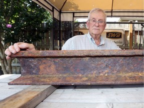 Local transportation historian Bernie Drouillard with a piece of streetcar rail dating to 1929 which was unearthed on Sandwich Street during construction of the roundabout in August 2017.