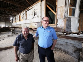 Shown in this Aug. 10, 2017 photo, Windsor Mayor Drew Dilkens and businessman George Sofos hope to restore the No. 351 streetcar which once rolled on the streets of Windsor.