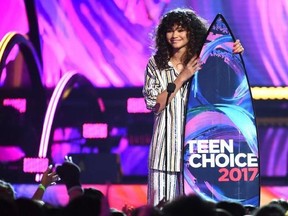 Zendaya accepts the award for choice summer movie actress for &ampquot;Spider-Man: Homecoming&ampquot; at the Teen Choice Awards at the Galen Center on Sunday, Aug. 13, 2017, in Los Angeles. (Photo by Phil McCarten/Invision/AP)