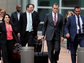 Douglas Baldridge, second from right, attorney for pop singer Taylor Swift, leads his legal team out of the federal courthouse after a ruling in the civil trial for the singer to determine whether a Denver radio announcer groped the singer in a case in federal court late Friday, Aug. 11, 2017, in Denver. A judge on Friday threw out a former radio host&#039;s case against Taylor Swift in a trial that delved into their dueling lawsuits over whether he groped her during a backstage meet-and-greet and wh