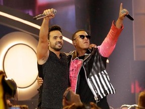 FILE - This April 27, 2017 file photo shows singers Luis Fonsi, left, and Daddy Yankee during the Latin Billboard Awards in Coral Gables, Fla. An MTV spokesperson said in a statement to The Associated Press on Monday, Aug. 14, 2017, that the ‚ÄòDespacito‚Äô video was not submitted for consideration for nomination at the 2017 Video Music Awards. The hit song‚Äôs video has not aired on MTV or MTV2, but is being played on MTV Tres, the company‚Äôs Latin channel. Universal Music Latin Entertainment,