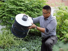 Manager of Health Inspection Phil Wong, of Windsor-Essex Health Unit with BG Sentinel 2 mosquito trap used to discover Aedes aegypti mosquito on August 22, 2017.