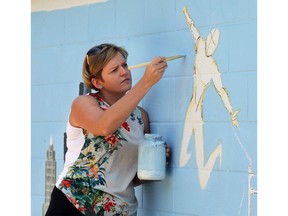 Mural artist Grace Chaberska is painting a mural honouring a little boy who was killed by a hit-and-run driver Saturday August 26, 2017.  The mural is located on a garage wall near Bruce Avenue Park, formerly known as The Bowling Green.