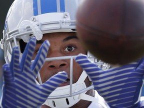 Detroit Lions cornerback Teez Tabor catches a ball during NFL football training camp in Allen Park, MI. on July 31, 2017.