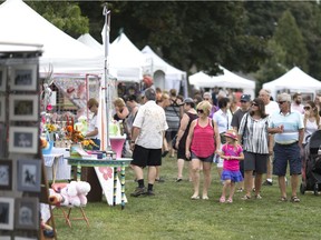 People check out dozens of vendors at the Art by the River at Fort Malden in Amherstburg, Saturday, August 27, 2016.