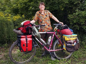 American biologist Sara Dykman is shown at Point Pelee National Park, Aug. 22, 2017. She is biking the 16,000-km route of the monarch butterfly migration between Canada to Mexico and back.