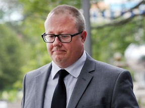 Andrew Cowan, 47, leaves the Superior Court of Justice in Windsor, ON. on Tuesday, August 1, 2017. He pleaded not guilty  to first-degree murder in connection with an incident that took place in October, 2012.