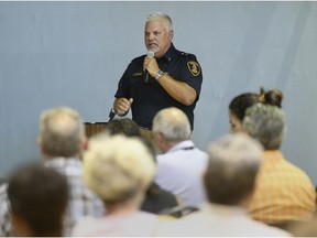 Windsor Police Insp. Jason Crowley speaks to downtown residents during the Downtown Neighbourhood Project meeting on Wednesday August 9, 2017 in Windsor, Ontario.