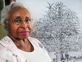 Elise Harding-Davis is shown at her Essex, ON. home on Thursday, August 24, 2017. She is shown with a copy of the Lee family tree, the family of Robert E. Lee, the General of the Confederate Army in the United States. Harding-Davis has discovered that her family tree connects to the Lee family.