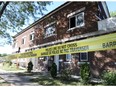 Police tape surrounds an apartment building at 400 Tecumseh Rd. W. on August 5, 2017, where a suspicious fire broke out early Saturday morning.