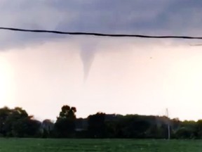 A screen capture from a video shot by Kaily Zack shows the funnel cloud beginning of a tornado in Wheatley, Aug. 11, 2017.