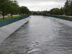 Storm-enhanced water levels almost overflow the Grand Marais Drain in south Windsor on Aug. 29, 2017.