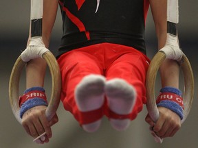 Gymnastics

WINDSOR, ONT.;APRIL 6, 2013 -- Kieran Mehta, from Gymnastics Mississauga, competes on the rings at the Ontario Gymnastics Championships at the St. Denis Centre, Saturday, April 6, 2013.  (DAX MELMER/The Windsor Star)
Dax Melmer, Dax Melmer