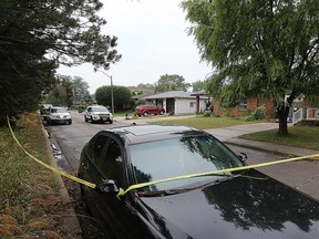Police tape surrounds a residence in the neighbourhood of the 2600 block of Jefferson Boulevard in Windsor's east end on the morning of Aug. 17, 2017. A stabbing incident resulted in assault charges against three men - two of whom suffered serious injuries.