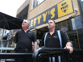 Alex, left, and Mike Lambros, owners of Lefty's on the "O" on Ouellette Avenue, say rising city costs have forced them to cancel August Fest.