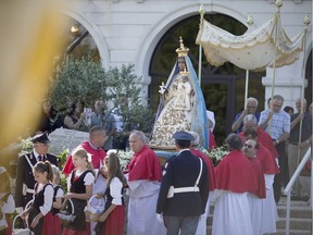 The statue of the Madonna of Canneto is carried in a procession from the Ciociaro Club Chapel into the Ciociaro Club during the 30th anniversary of the Madonna di Canneto, Sunday, August 20, 2017.