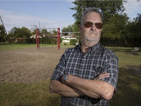 South Windsor resident Gary Graves, standing in at Mark Park on Thursday, is upset playground equipment at the park was removed by the city with no real plans to replace it.