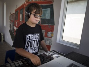 Hazen Jasey, 10, aka DJ Blazin' Hazen, performs at the last Walk-In Wednesday of the summer at the Children's Safety Village on Aug. 16, 2017.