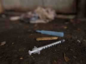 Discarded syringes in an alley in downtown Windsor are shown in this photo taken Aug. 7, 2017.