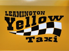 The logo of Leamington Yellow Taxi is shown on a van on Tuesday, August 15, 2017.