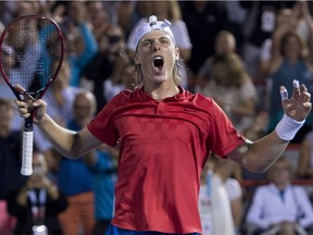 Denis Shapovalov of Canada celebrates after defeating Adrian Mannarino of France during quarter-final play at the Rogers Cup tennis tournament Friday August 11, 2017 in Montreal.