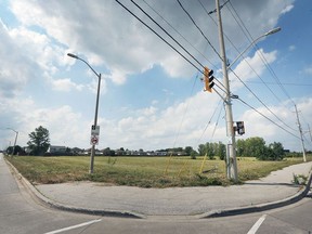 A developer has proposed a multi-family development for this lot located at Walker Road and Ducharme Street in Windsor. The plan calls for townhouses and an apartment building with commercial units on the main floor.