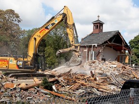 St. George's church buildings are demolished Sept. 14, 2017, at Kildare Road and Devonshire Court.
