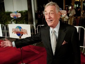 FILE - In this Dec. 16, 2004 file photo, comedian Shelley Berman, who has a role in the new film &ampquot;Meet the Fockers,&ampquot; poses at the premiere of the film in Universal City, Calif. Berman, whose groundbreaking routines in the 1950s and 1960s addressed the annoyances of everyday life, has died. He was 92. Publicist Glenn Schwartz says Berman died Friday, Sept. 1, 2017 at his home in Bell Canyon, Calif. He was 92. (AP Photo/Chris Pizzello)