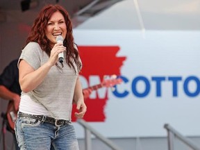 In this Friday, June 6, 2014, photo, country music singer Jo Dee Messina sings onstage in El Dorado, Ark., during a fundraiser for Rep. Tom Cotton, R-Ark. The country singer, who had hits with songs like ‚ÄúI‚Äôm Alright‚Äù and ‚ÄúBye Bye,‚Äù announced Wednesday, Sept. 6, 2017, that she has cancer and will be postponing her 2017, show dates after Oct. 7, 2017. (Michael Orrell/The El Dorado News-Times via AP, File)