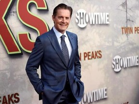 Kyle MacLachlan, a cast member in &ampquot;Twin Peaks,&ampquot; poses at the premiere of the Showtime series at The Theatre at Ace Hotel on Friday, May 19, 2017, in Los Angeles. MacLachlan isn&#039;t surprised to hear viewers were confounded by the finale of &ampquot;Twin Peaks.&ampquot; THE CANADIAN PRESS/AP-Photo by Chris Pizzello/Invision/AP