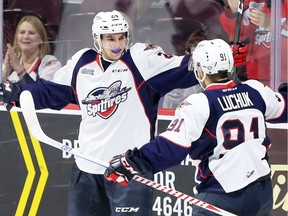 Windsor Spitfires winger Mathew MacDougall, left, celebrates his first OHL goal, on a pass from Aaron Luchuk, against Guelph Storm at the WFCU Centre ion Sunday. (NICK BRANCACCIO/Windsor Star)