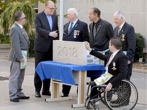 Windsor Mayor Drew Dilkens speaks with Masons David LaBrun, left, George Minto, Mark Van Watteghem, Maurice Howles and Cameron Adamson during a Sept. 30, 2017, cornerstone ceremony for Windsor's new city hall.