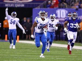 Jamal Agnew of the Detroit Lions returns an 88-yard punt return for a touchdown in the fourth quarter against the New York Giants at MetLife Stadium on Sept. 18, 2017 in East Rutherford, N.J.