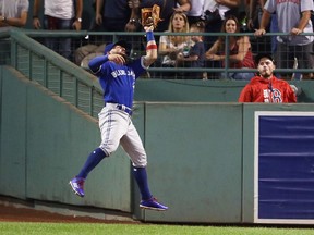 Kevin Pillar of the Toronto Blue Jays catches a fly ball hit by Deven Marrero of the Boston Red Sox during the seventh inning at Fenway Park on Sept. 26, 2017 in Boston.