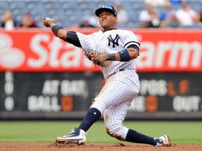 Starlin Castro  of the New York Yankees throws to first in the fifth inning against the Toronto Blue Jays at Yankee Stadium on Sept. 29, 2017. The Yankees went on to beat the Jays 4-0.