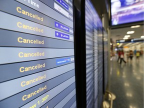 FILE - This Friday, Sept. 8, 2017, file photo, shows a monitor listing canceled flights at Miami International Airport in Miami. As of Monday, Sept. 11, 2017, airlines have canceled more flights as air travel in Florida remains grounded and Irma spins farther north. High winds have caused Delta and American to cancel many flights in Atlanta and Charlotte, N.C. Airlines hope to resume Miami flights Tuesday. (AP Photo/Wilfredo Lee, File) ORG XMIT: NYBZ110

FRIDAY, SEPT. 8, 2017, FILE PHOTO
Wilfredo Lee, AP