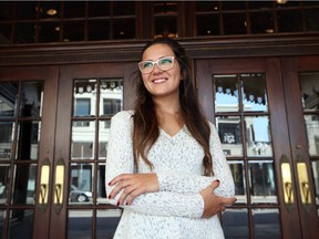 Cierra Bray, 23, of Windsor, stands in front of the Capitol Theatre before delivering her award-winning pitch on Inclusive Posterity — part of the Lieutenant Governor's Visionaries Prize contest. Photographed Sept. 21, 2017.