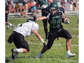 Zack Zimmerman, left, of Riverside closes in on Jonah Gray of E. J. Lajeunesse during their game on Sept. 22, 2017.