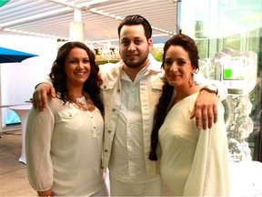 Family Respite Services co-ordinator Alexandra Fischer, left, and co-owners of Dry Palour Inc. George Kalivas and Sylvia Gounakis, attend the Brunch en Blanc fundraiser on Sept. 13, 2014.