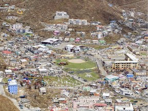 In this undated photo provided on Sunday Sept. 10, 2017, by the British Ministry of Defence, some of the damage to The British Virgin Isles, seen from the air. The wild isolation that made St. Barts, St. Martin, Anguilla and the Virgin Islands vacation paradises has turned them into cutoff, chaotic nightmares in the wake of Hurricane Irma, which left 22 people dead, mostly in the Leeward Islands.