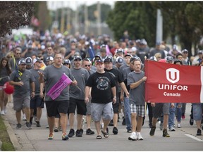 The annual Labour Day parade marches down Walker Road on Monday, Sept. 4, 2017.