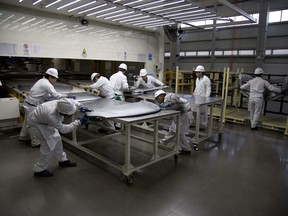 Employees at work in the new multibillion-dollar Honda car plant in Celaya, in the central Mexican state of Guanajuato on Feb. 21, 2014.