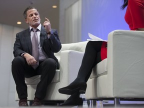 Quicken Loans founder Dan Gilbert is interviewed by Bloomberg News anchor Betty Liu at the North American International Auto Show at Cobo Hall on Jan. 8, 2017. Gilbert is spearheading a bi-national proposal that would include Detroit Windsor for a second North American headquarters for Amazon.