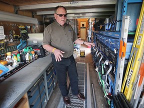 Steve Elliott, Samaritan's Purse co-ordinator for central Canada, shows some of the supplies and equipment in the Disaster Relief Unit which arrived Thursday at the Parkwood Gospel Temple to help victims of the latest flood in Windsor.