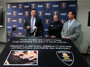 From left: Det. Ted Novak, Sgt. Steve Betteridge, and Det. David Tennent of Windsor Police Service stand in front of a poster promoting the new WPS online reporting tool for victims of sexual assault. Photographed Sept. 26, 2017.