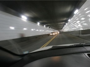 Cars make their way through the Windsor/Detroit tunnel.