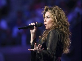 Shania Twain performs during opening ceremonies for the U.S. Open tennis tournament in New York, Monday, Aug. 28, 2017. Bell Media says the five-time Grammy Award winner will be a mentor on the inaugural season of "The Launch," which is in production.
