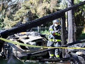 Windsor firefighters assist arson investigators Oct. 9, 2017,at 1515 Arthur Rd. following an early-morning fire that sent one person to a London hospital with burns.